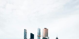 Benefits of Tutors in Melbourne Tutor helping a student with study work at a desk