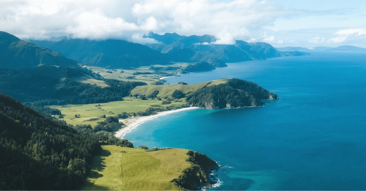 Scenic New Zealand landscape with mountains and open countryside