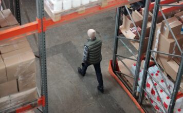 11 Space Optimization Strategies for Small to Medium Industrial Sites Organized storage racking inside a small industrial warehouse